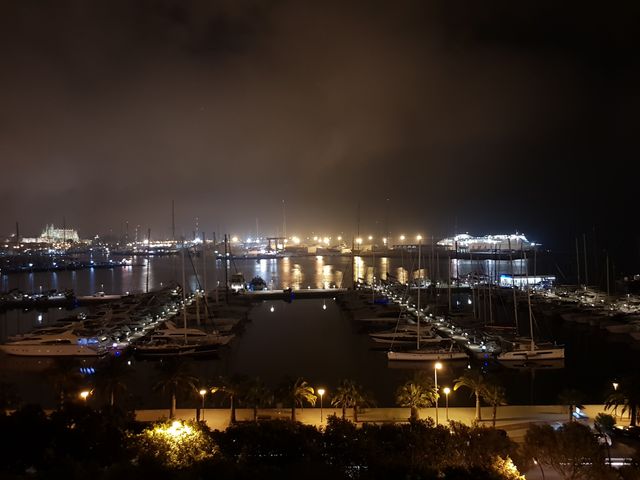 Watching the ships coming and leaving at night